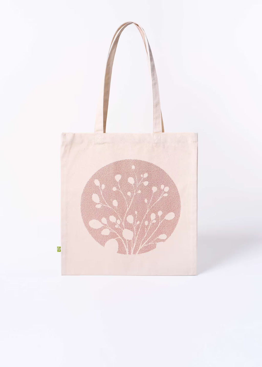 Tote bag Arena Roja Crystal Peppers — vista frontal con motivo botánico serigrafiado en arena roja sobre lienzo natural, etiqueta ecológica verde