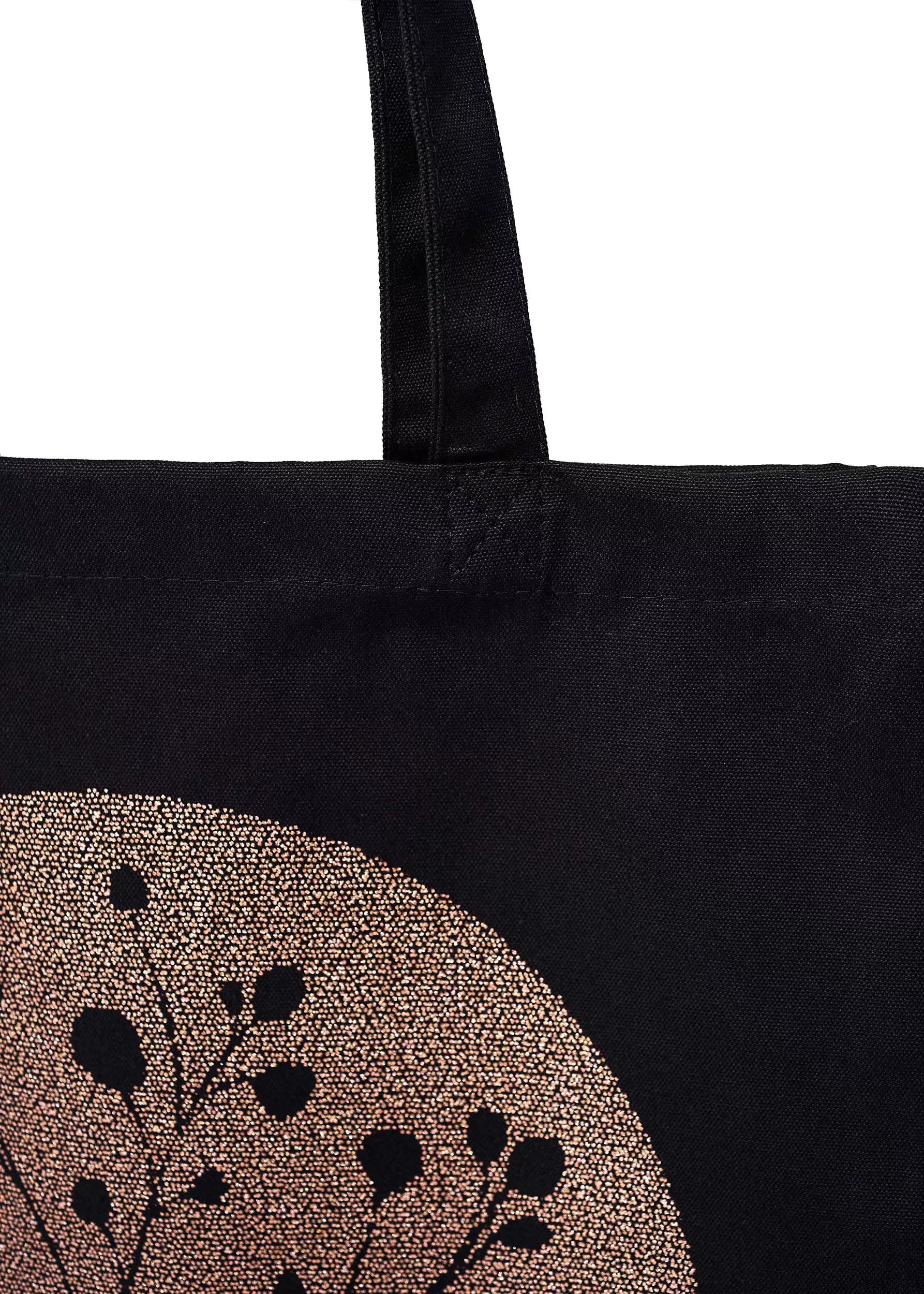 Detalle del asa y costura superior del tote bag Carbón Cobre Crystal Peppers — algodón orgánico negro 340 g/m²